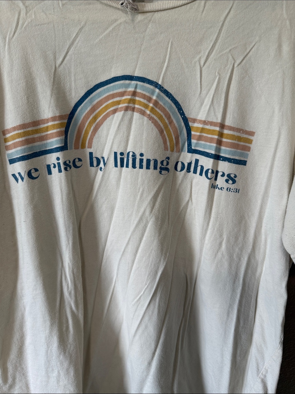 🥳 7/$10!! Cream Graphic Tee - 'We Rise By Lifting Others' - Picture 3 of 3